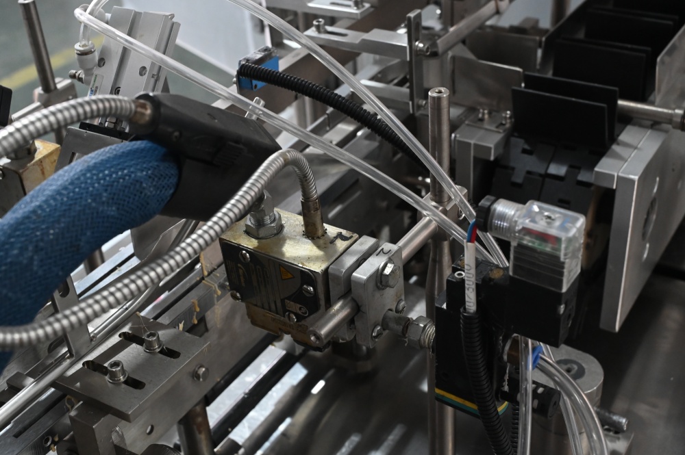 トップフラップの閉鎖と密封システム