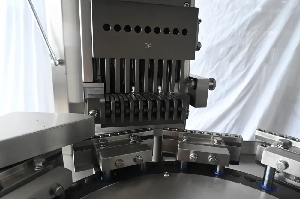 Teile einer Kapselabfüllmaschine und ihre Bezeichnungen 14 Sortiermechanismus