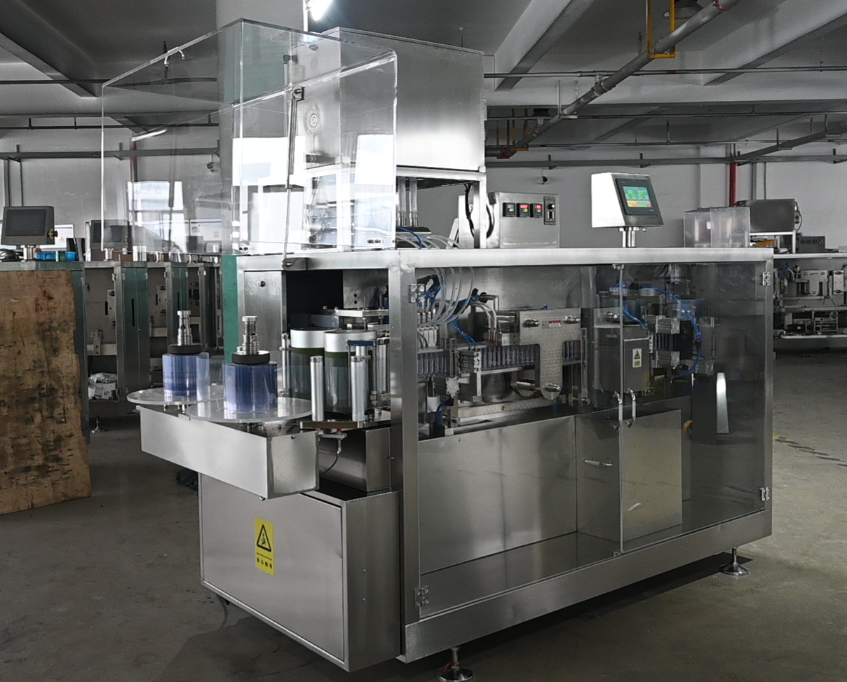 Ampoule filling and sealing machine