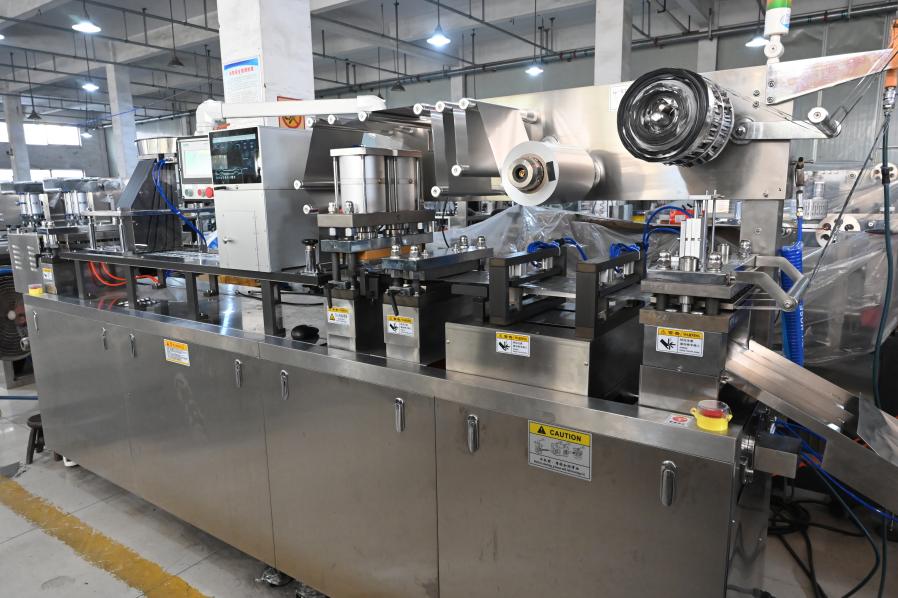 thermoforming blister packaging machine