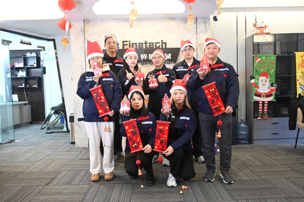 Finetech team members celebrates the arrival of Christmas.