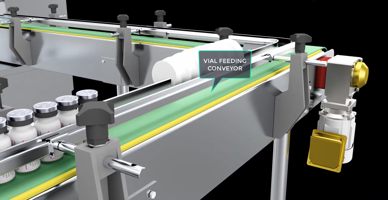 Loading vials onto the conveyor