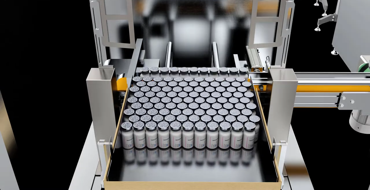 Inserting vials into the carton