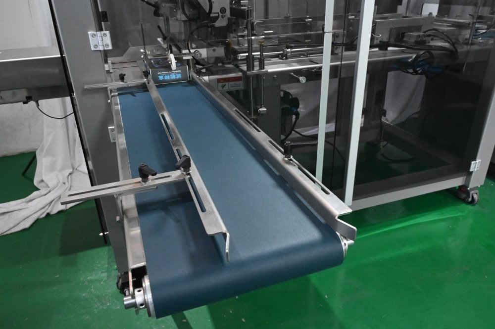 Cinta transportadora para cajas de envases de vidrio